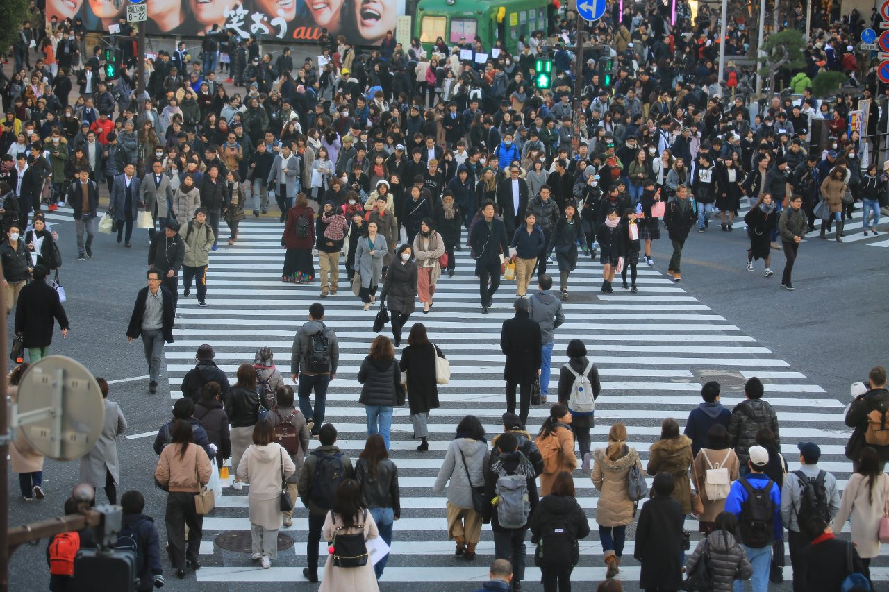 City view of Shibuya crossing showcasing users of Japanese super apps
