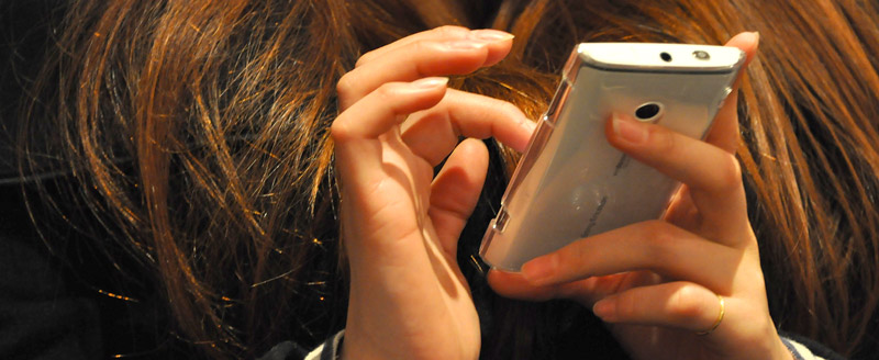 a woman using a smartphone