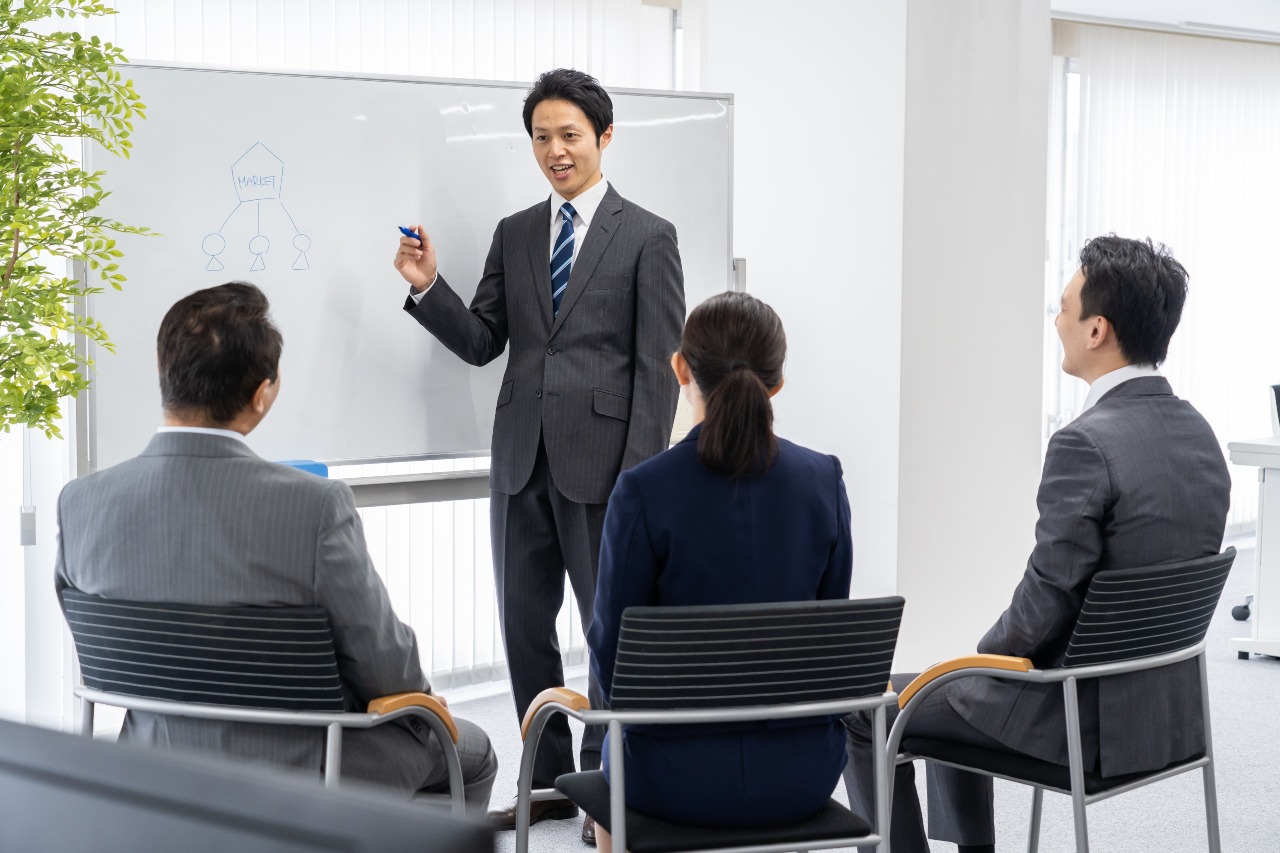 Corporate Japanese team planning future strategies for digital marketing in Japan