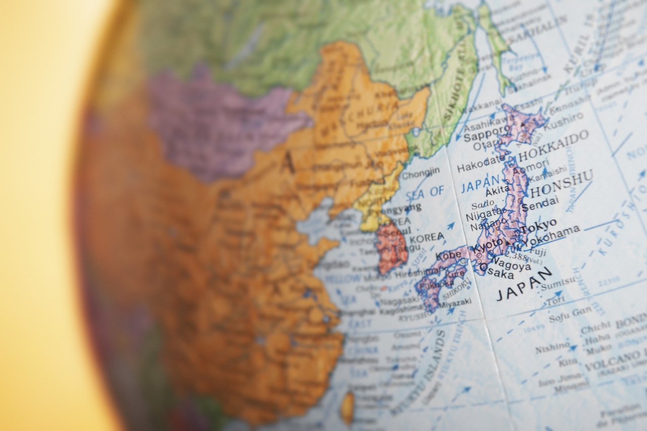 A globe of world luxury fashion markets centered on Japan.