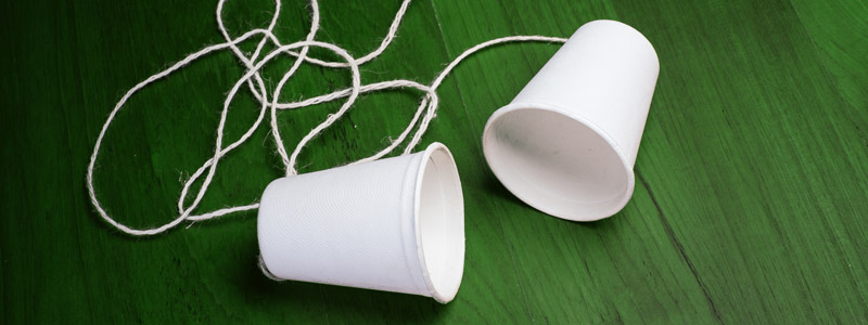 white-cups-on-green-table