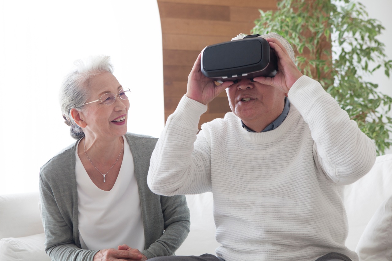Older Japanese couple using virtual shopping for online sales in Japan