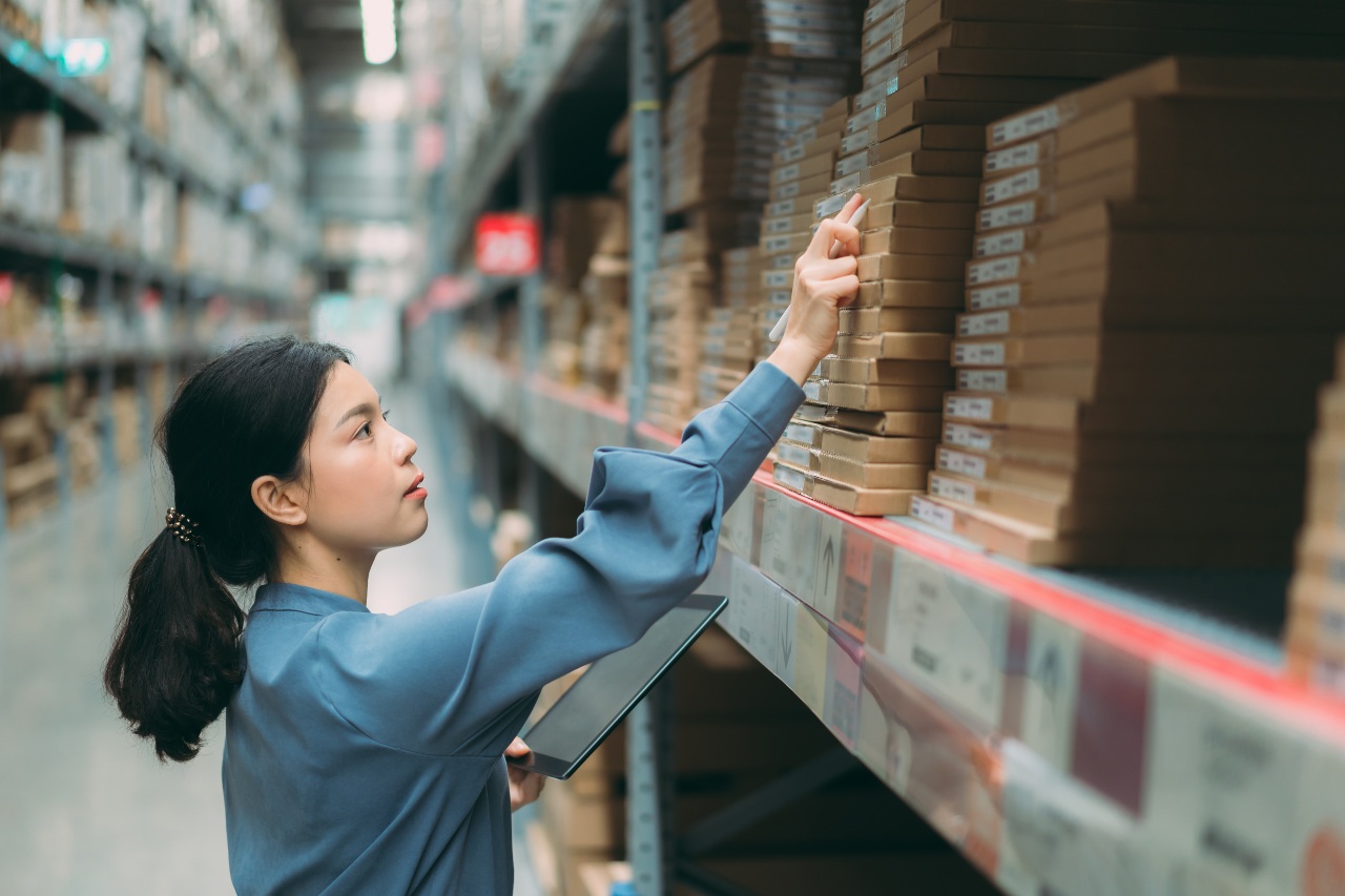 Warehouse manager handling stock for company selling online in Japan
