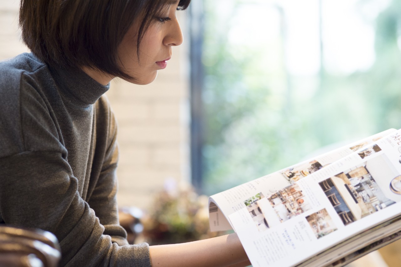 Women enjoying magazine advertising in Tokyo
